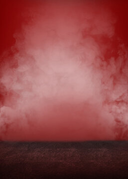 Dramatic red and smoky background with a dark textured foreground.