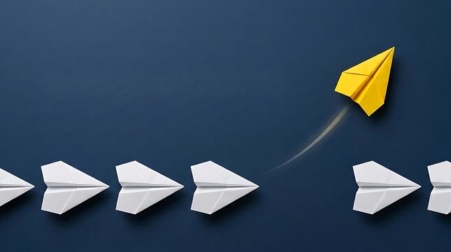 Yellow paper airplane breaking away from white planes flying upward representing leadership, innovation and thinking differently
