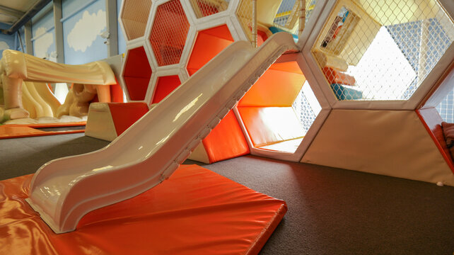 Indoor playground slide and soft play structures for children's fun and games