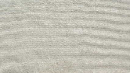 Fototapeta premium off white fine knit fabric texture background with soft neutral beige wool weave for cozy sustainable fashion design