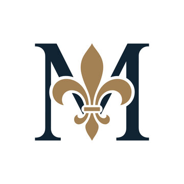 Letter m logo design with a golden fleurdelis symbol integrated
