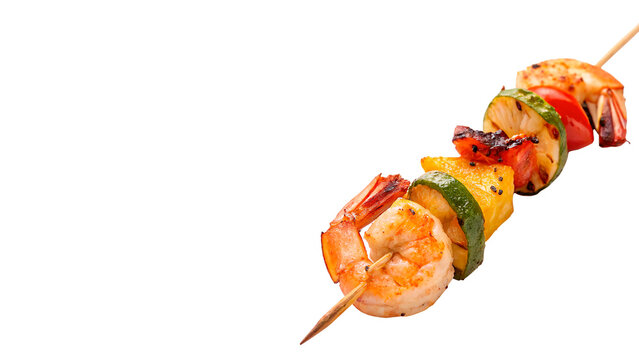 Delicious grilled seafood shrimp and vegetable kebab skewer isolated on transparent background