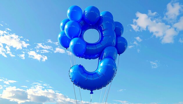 Blue balloons in the shape of number nine floating in the sky.