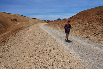 Fototapeta premium Female hiker on wide Montana Blanca trail