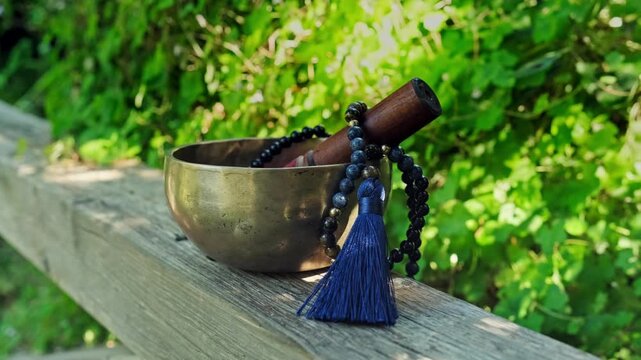 Tibetan singing bowl with rosary mala