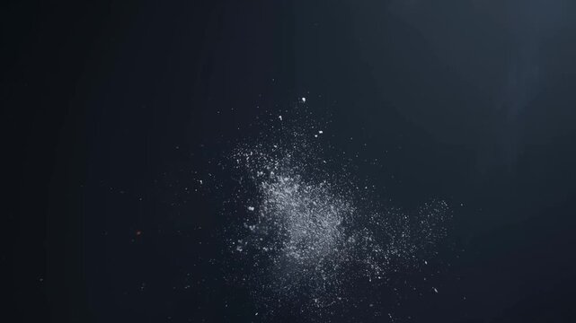 Abstract representation of a human face dissolving into particles. Exploring themes of identity, transformation, and the ephemeral nature of existence