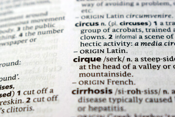 Fototapeta premium English Dictionary Page Close Up With The Word Definition Of - cirque