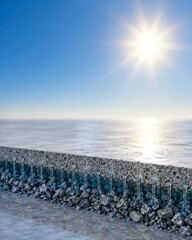 Obraz premium A bright sun shines over a frozen landscape with a textured foreground of ice and rocks.