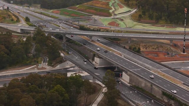 Aerial drone view of vehicles using the newly opened M7 -M12 Interchange at Cecil Hills, Sydney, NSW Australia on the morning of 14 June 2026