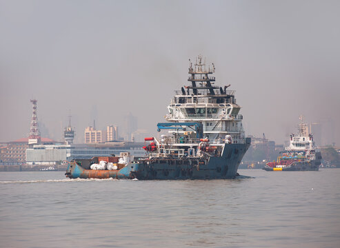 Commercial shipping at anchor in the Arabian Sea off the coast of Mumbai, India, which is the busiest port in South Asia