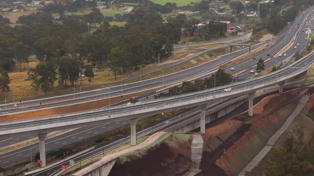 Aerial drone view of vehicles using the newly opened M7 -M12 Interchange at Cecil Hills, Sydney, NSW Australia on the morning of 14 June 2026