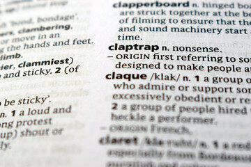 Fototapeta premium Close Up English Dictionary Page With The Word Translation Of - claptrap