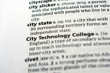 Fototapeta premium English Dictionary Page Close Up With The Word Definition Of - city state