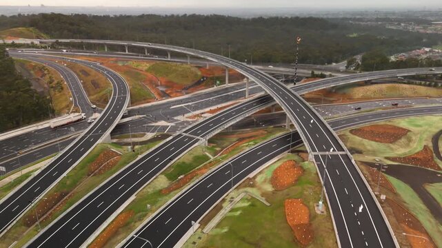 Aerial drone reverse view above the newly opened M7 -M12 Interchange at Cecil Hills, Western Sydney, NSW Australia on the morning of 14 June 2026