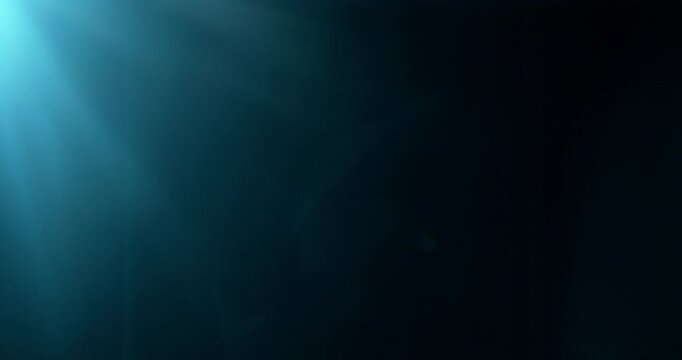 Slow motion cinematic lens flare and light leak effect isolated on black background. Perfect overlay for VFX, transitions, title reveals, film burn style and glow highlights.