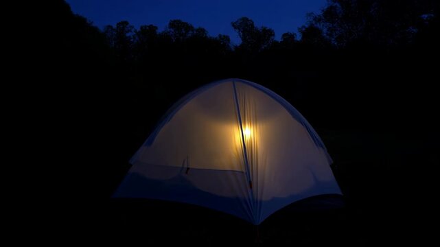 Glowing Dome Tent in Quiet Forest Clearing at Dusk