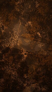 Close-up of batik fabric texture in brown and gold
