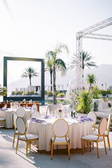 Obraz premium Elegant outdoor wedding dinner setup at Porto Montenegro