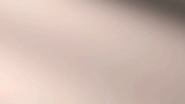 Soft, minimalist light beige gradient background with subtle shadows and smooth texture, creating a clean and elegant abstract surface.