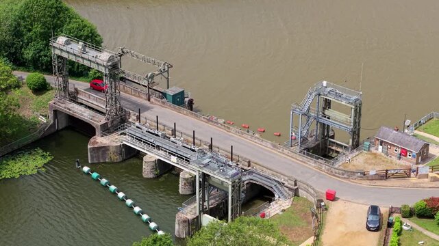 Close Up Aerial View of Denver Sluice Gate and Massive Flood Management Barrier on the River Great Ouse UK