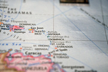 Fototapeta premium Antigua Caribbean Island Highlight on World Map Photograph with Soft Blur Background
