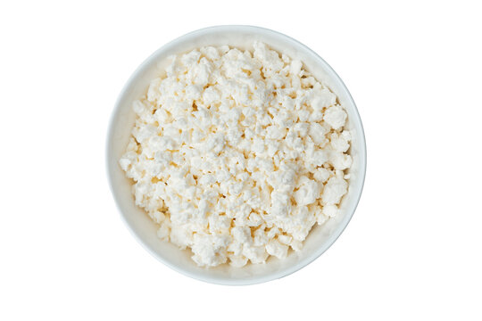 Bowl of cottage cheese on a white background