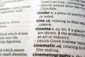 Fototapeta premium English Dictionary Page Close Up With The Word Definition Of - cinema