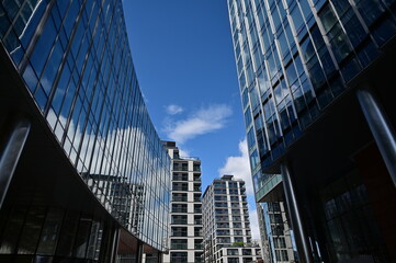 Naklejka premium Facades of modern buildings and the blue sky