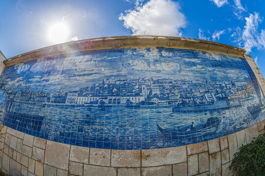 LISBON,PORTUGAL-APR. 8,2024:Mirador de Santa Lucia, Alfama district.Tile Azulejos panel depicting a drawing of the Pra&ccedil;a do Com&eacute;rcio as it was in 1718,before it was destroyed in the earthquake of 1755