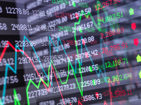 Digital composite of two stock market data displays