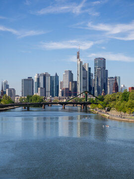 Frankfurt skyline over the Main river in Germany on a sunny day