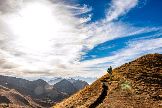 Backlit mountain landscape on Praettigauer Hoehenweg in Austria