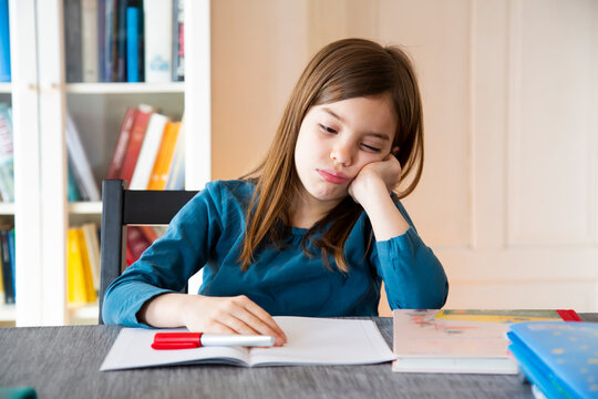 Frustrated girl with homework