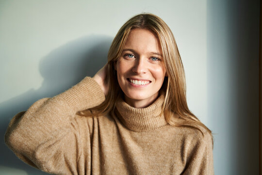 Portrait of smiling blond young woman
