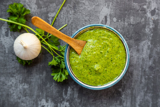 Argentinian chimichurri verde, barbecue sauce, overhead view