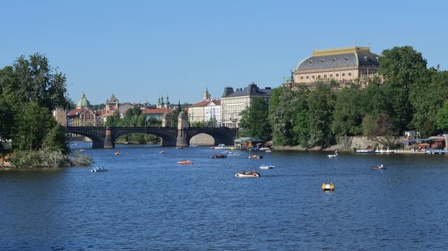 Water bikes on Vltava river in city of Prague, Czechia (Czech Republic).