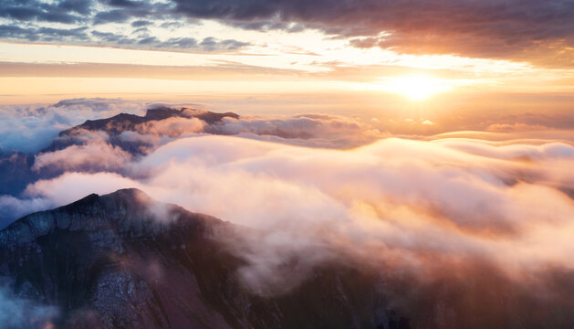 Breathtaking panoramic view of a mountain range, Ennstal Alps, Styria, Austria. Their peaks shrouded in mist. Rugged terrain in Austrian Alps. Wanderlust