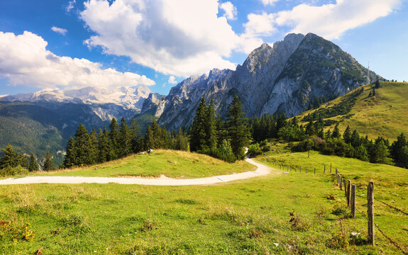 Gosausee lake in Austria Alps mountains. Austria alpine landscape in summer near Dachstein mountain range. Scenic waterfront and natural surroundings popular tourist destination in Austria Gosau See