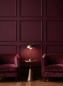 Two plush burgundy armchairs flank a gold lamp on a small table. The paneled wall behind them is a deep red hue. Wooden floor adds warmth. Minimalist lounge.