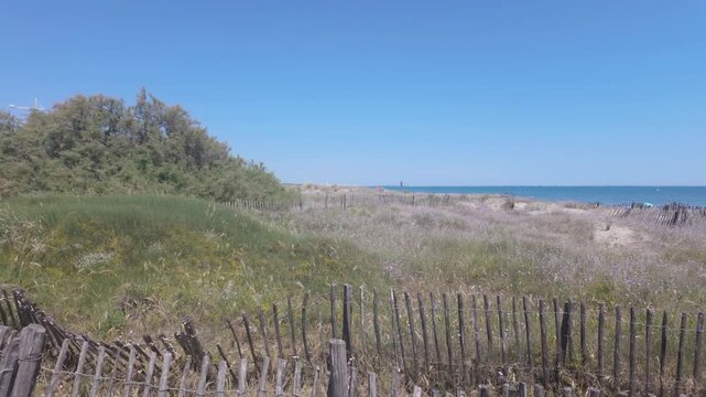 Scenic Coastal View of Plage Le Petit Travers with Dunes
