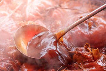 Fototapeta premium steaming delicious braised Chinese pork trotters food