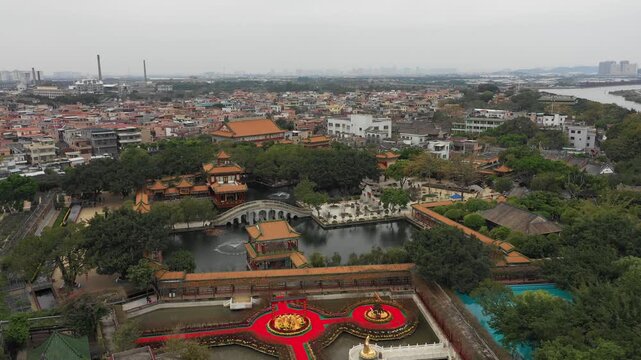Establishing drone shot of beautiful classic Chinese garden in Guangzhou, China
