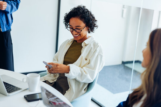 Businesswoman using a smartphone at the office