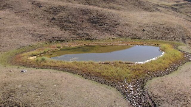 Caucasus, North Ossetia. Ualak Gorge. Lake in an alpine meadow.