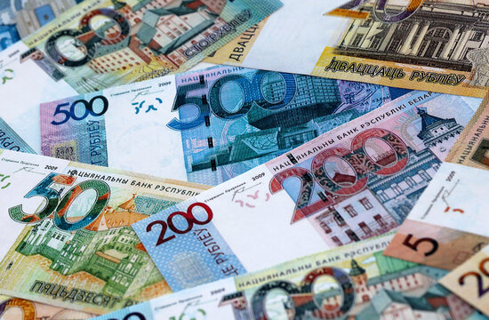 Belarusian ruble money banknotes pile on table. Belarus bills of BYN currency close up