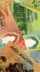 Brunei Darussalam dollar money bills in pile on table. Brunei BND currency cash close up © Viktor