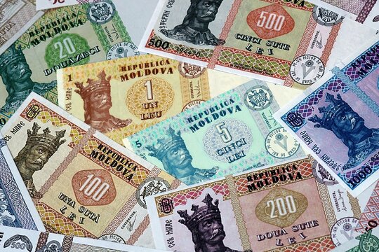 Moldovan leu money bills in pile. Big amount of Moldova MDL currency cash close up