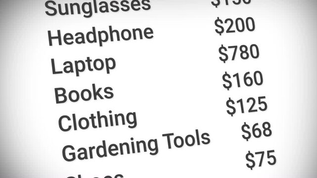 Close and detailed view of the cash receipt by showing the nominal amount of groceries and vats on a computer screen, suitable for monthly expense videos.