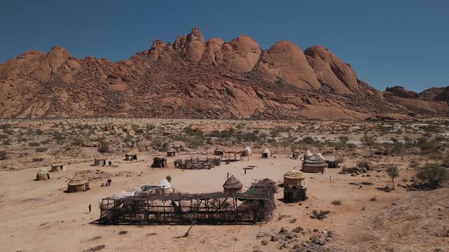 Aerial view of a himba village in the spitzkoppe desert, damaraland, namibia, Africa