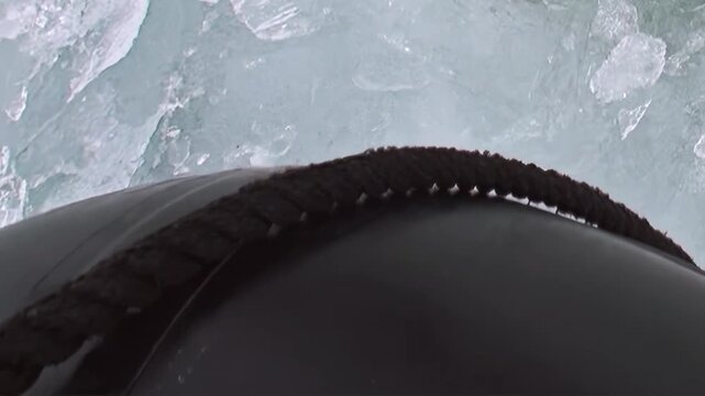 Experience a powerful ship's bow forging ahead through the vast, icy expanse of the Arctic Ocean. Watch as frozen floes fracture and water churns beneath the vessel on its challenging polar journey.
